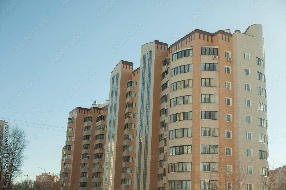 Fototapeta premium Building in city. Urban development. Details of big city.