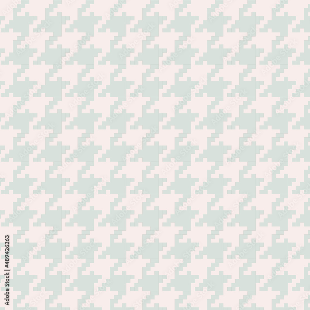Subtle houndstooth pattern background with low contrast colors of pale blush pink and light green. Subtle houndstooth pattern background with low contrast colors of pale blush pink and light green.