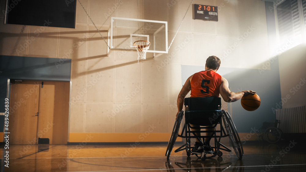Wheelchair Basketball Player Wearing Red Shirt Dribbling Ball Like a