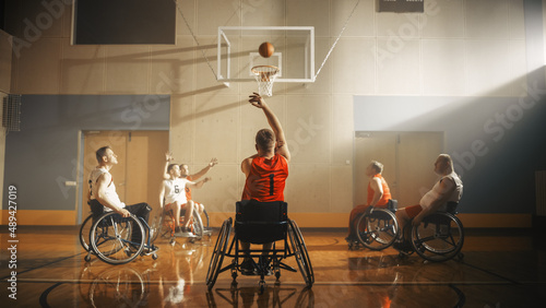 Vászonkép Wheelchair Basketball Game: Professional Players Competing, Dribbling Ball, Passing