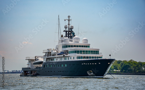 Superyacht in New York Harbor with Statue of Liberty in the background © James M. Davidson