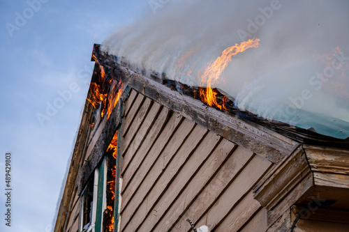 A two-story house fully engulfed structure fire