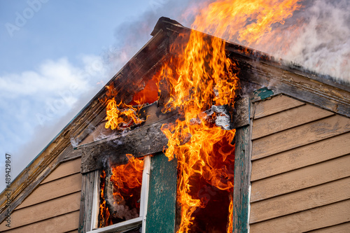 A two-story house fully engulfed structure fire