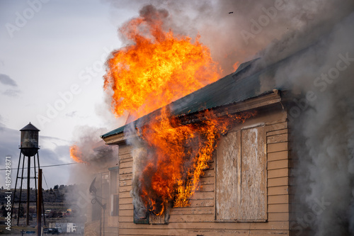 A two-story house fully engulfed structure fire