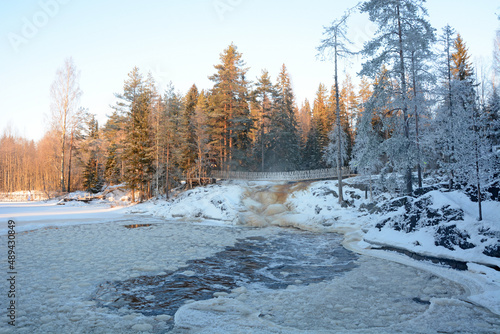 Fototapeta Naklejka Na Ścianę i Meble -  One of the most famous places in the Republic of Karelia is the Ruskeala waterfalls in the winter season. Traveling in Russia, Republic of Karelia