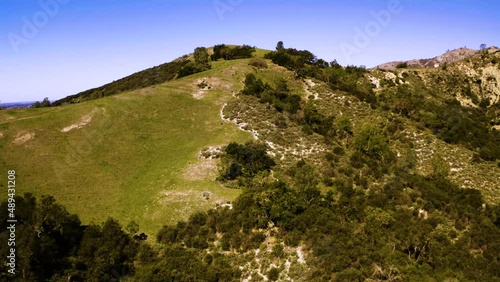 A collection of drone shots revealing incredible natural California landscapes, featuring vast lush views of green rolling hills, oak trees, and beautiful ranch land.