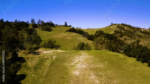 A collection of drone shots revealing incredible natural California landscapes, featuring vast lush views of green rolling hills, oak trees, and beautiful ranch land.