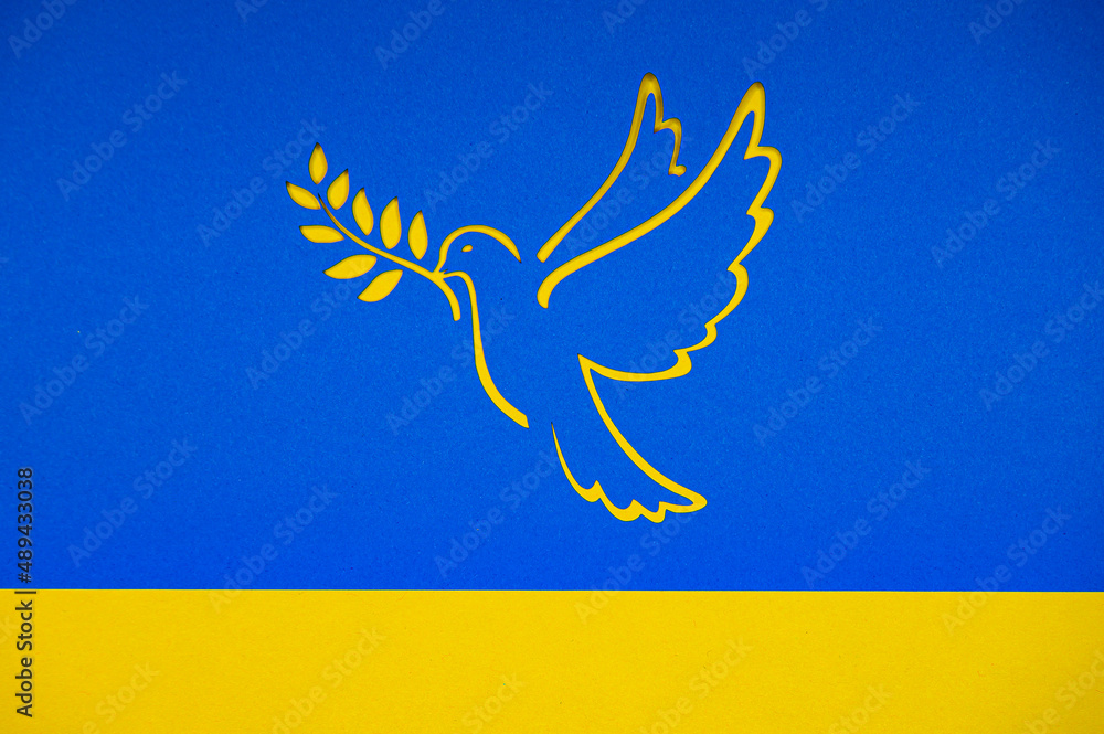 Peace in Ukraine in War after Attack from Russia. Dove as a symbol of  peace. On a yellow-blue background in the colors of the Ukrainian national  flag. Papercut Stock Photo | Adobe