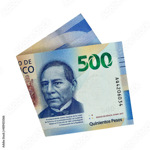 Single folded mexican peso bill isolated on white background