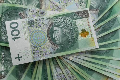 Polish Zloty PLN 100 PLN banknotes background. Cash, money, tax, economy, busines, bank, tax, bill, debt, success
