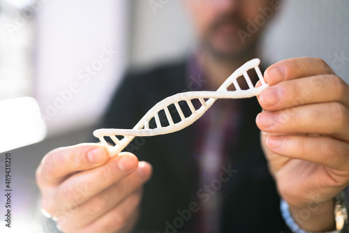 DNA Molecule In Hand. Biochemistry Science