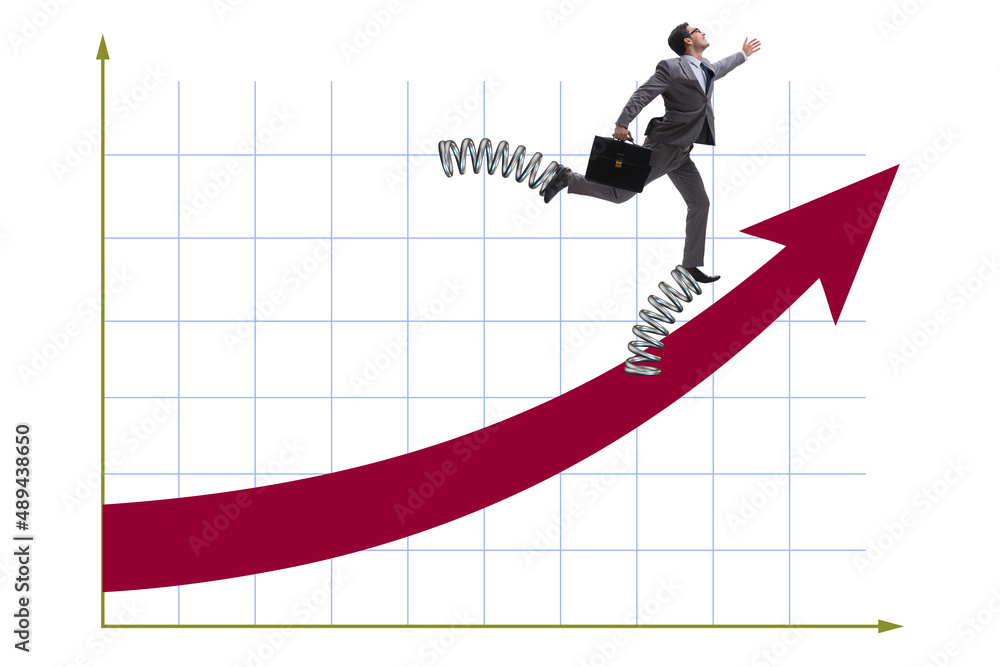 Businessman jumping high on springs Businessman jumping high on springs