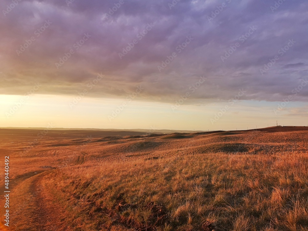 sunset in the field, beautiful clouds