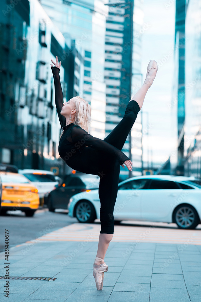 Ballerina dance on city street. Attitude pose. Ballet dancer. Stock Photo |  Adobe Stock