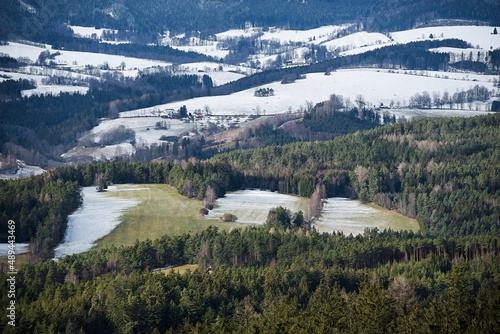 Landscape in Šumava, Bohemia. Outgoing winter and coming spring. Changing the season. A sunny day. © Mario
