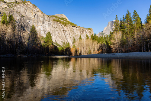 Sunny view of the half dome and merced river landscape of Yosemite National Park