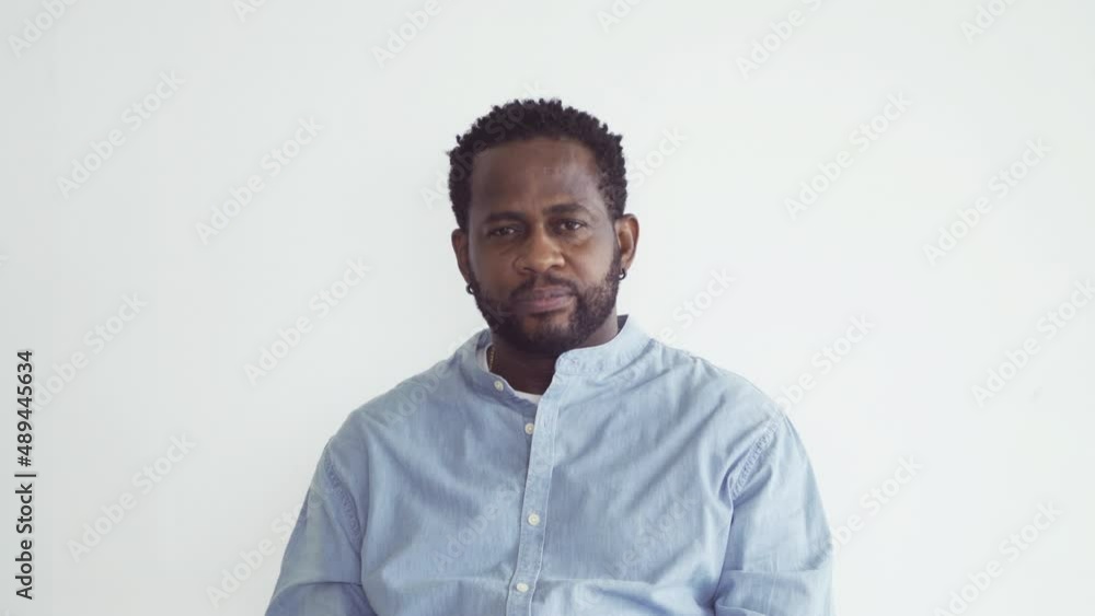 Portrait of happy smiling business Black African American man person talking in conference call with webcam camera device in technology device isolated on white. Portrait of happy smiling business Black African American man person talking in conference call with webcam camera device in technology device isolated on white.