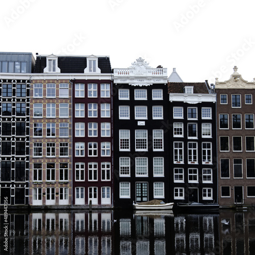 Dutch tall houses on canal in city center of Amsterdam, the Netherlands