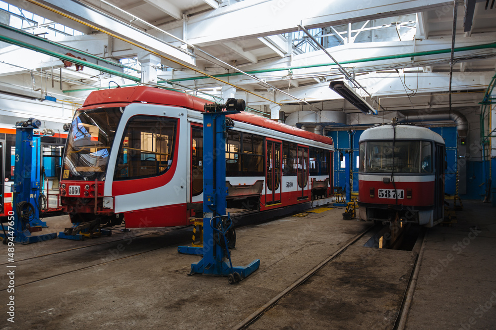 Trams in service depot. Maintenance and repairing of trams