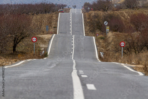 Asphaltstrasse durch die Mandelplantagen bei Albox in Andalusien photo