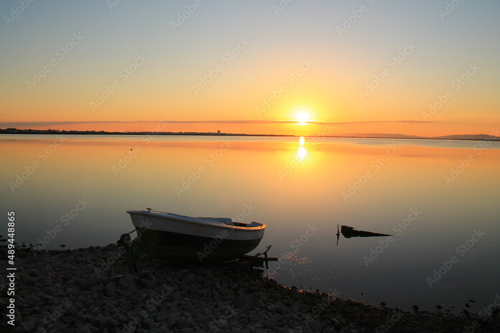 Amazing sunset in the natural Mejean lagoon, a protected wetland in Montpellier, France Amazing sunset in the natural Mejean lagoon, a protected wetland in Montpellier, France