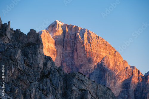 High cliffs during sunset. Dolomite Alps, Italy. Mountains and clear skies. V...