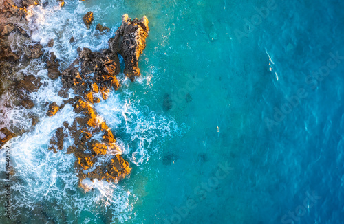 Mediterranean sea. Aerial view on the beach and rocks. Top view from drone at...