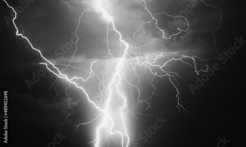 Thunder, lightnings and rain at night during summer storm.