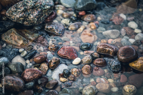 Smooth sea stones. Sea shore. Background. High quality photo