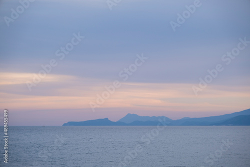 Mountain landscape. Cloudy weather and seascape.