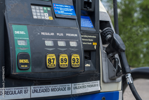 Konstfotografi A USA petrol pump shows the rising prices of fuel and the choices of octane avai