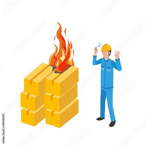 工場火災で焦る作業員男性