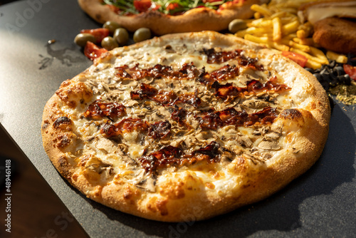 Bacon pizza served in the restaurant