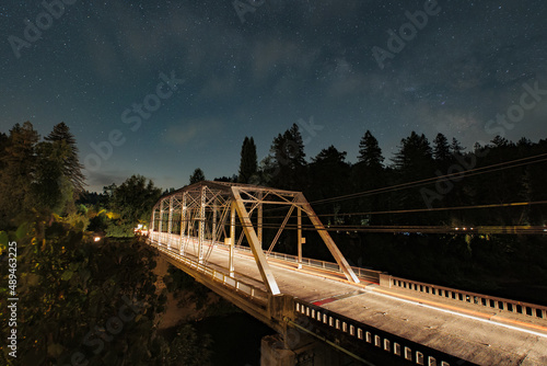 Old bridge at night with stars