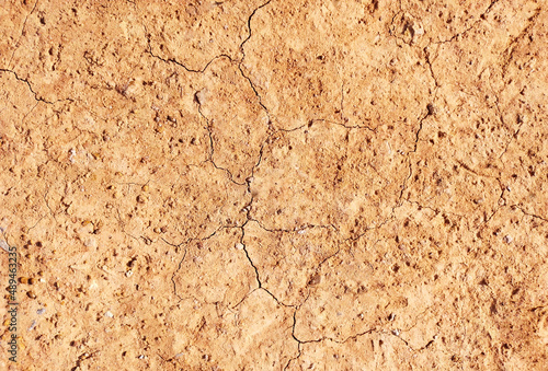 Cracked ground background in the top view for graphic design or wallpaper