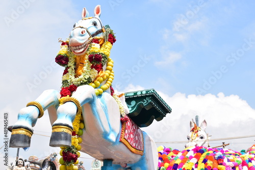The wooden horse chariot erected in front of the Kulamangalam Ayyanar Temple for the procession ahead of the Masi magam festival. Pudukkottai district, Tamil Nadu in South India.