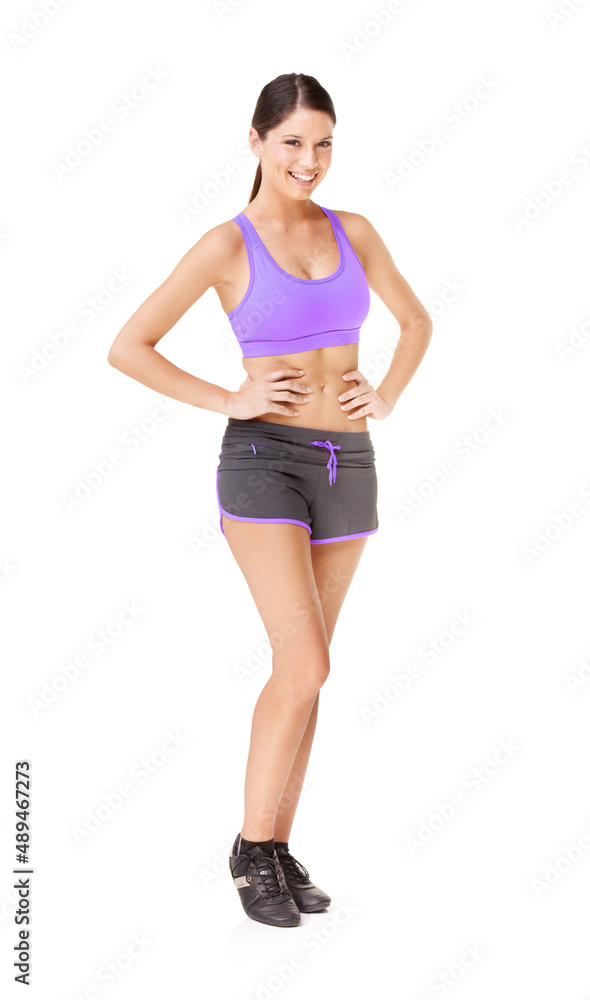 Looking like this takes a lot of work. Full length portrait of a fit young woman in gym clothing isolated on white. Looking like this takes a lot of work. Full length portrait of a fit young woman in gym clothing isolated on white.