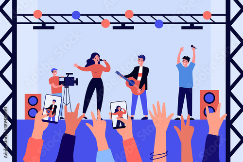 Hands of fans filming performance of music band on stage. Woman singing, man playing guitar flat vector illustration. Event, music, entertainment concept for banner, website design or landing web page