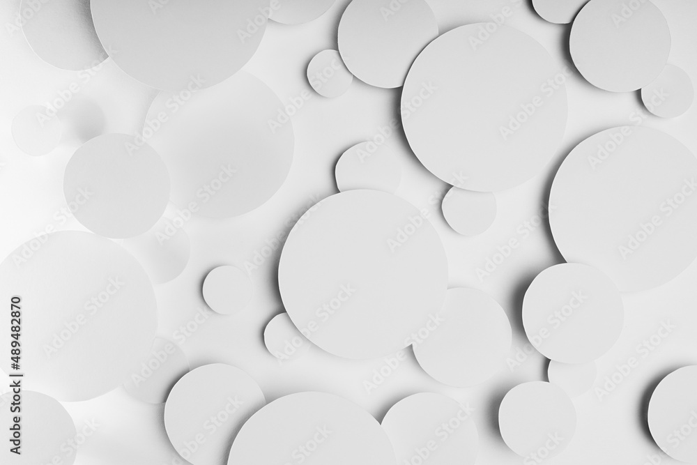 Abstract geometric texture of white paper circles in shining light with soft shadows as mess pattern, top view. Simple delicate clean airy calm mosaic background in minimal style. Abstract geometric texture of white paper circles in shining light with soft shadows as mess pattern, top view. Simple delicate clean airy calm mosaic background in minimal style.