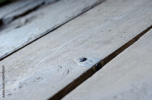 Defocus, blur, noise, grain effect. Wooden floorboards.