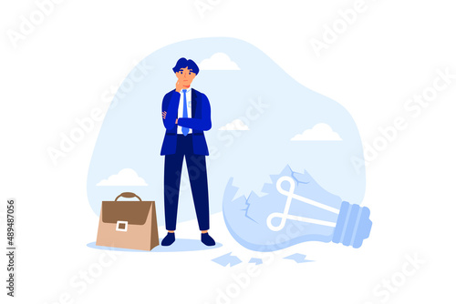 Uninspired or motivation after business failure, burnout or exhausted from crisis, no new idea or inspiration concept, depressed business man sadly standing with fail old broken lightbulb idea.
