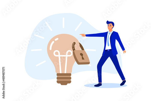 Intellectual property, patented protection, copyright reserved or product trademark that cannot copy concept, businessman owner standing with light bulb idea locked with padlock for patents.