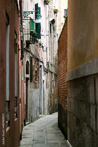 Old streets of venice with traditional hanging clothes © CesarBayona