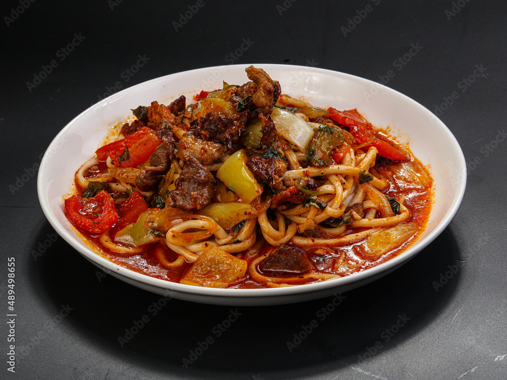 Asian traditional cuisine - lagman noodle Asian traditional cuisine - lagman noodle