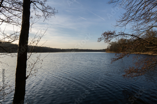 A serene spring day at the Rusalka lake in the city of Poznan before sunset
