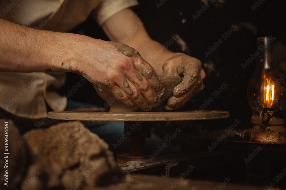 man makes Plate in pottery workshop, clay product, authentic atmosphere, background, footage. Lifestyle, indoor, cinema. Macro, close-up, hands. entrepreneur