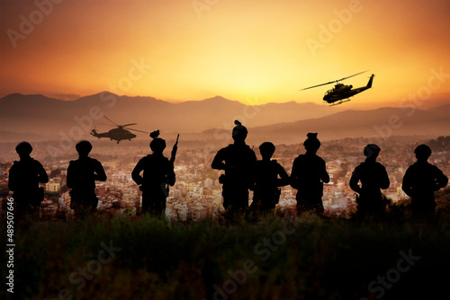 Silhouette of 8 armies standing and ready to attack the town below in the evening. Conceptual of war.