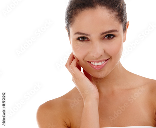 Beauty catches the eyes. Portrait of a beautiful young woman standing in a studio. photo