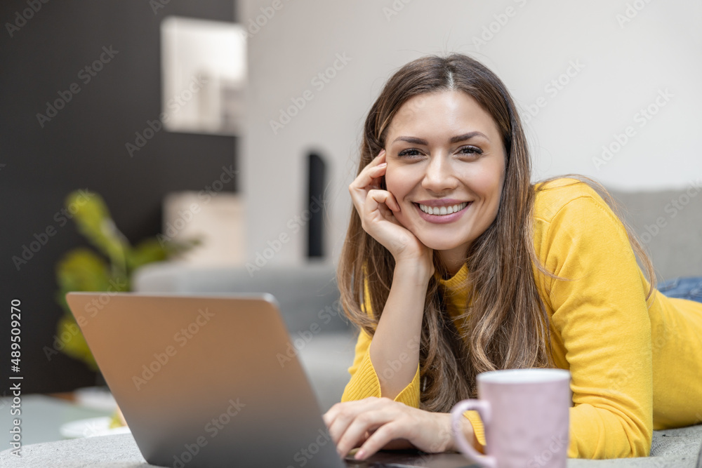 Young woman working on new project at home Young woman working on new project at home