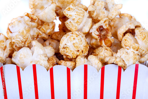 Popcorn with striped box close up photo